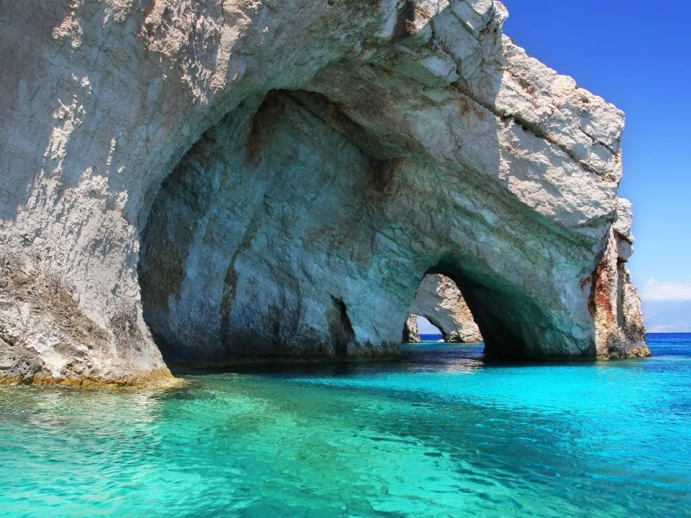 Excursion 6-Hour Sailing Yacht Cruise to Shipwreck Beach & the Blue Caves